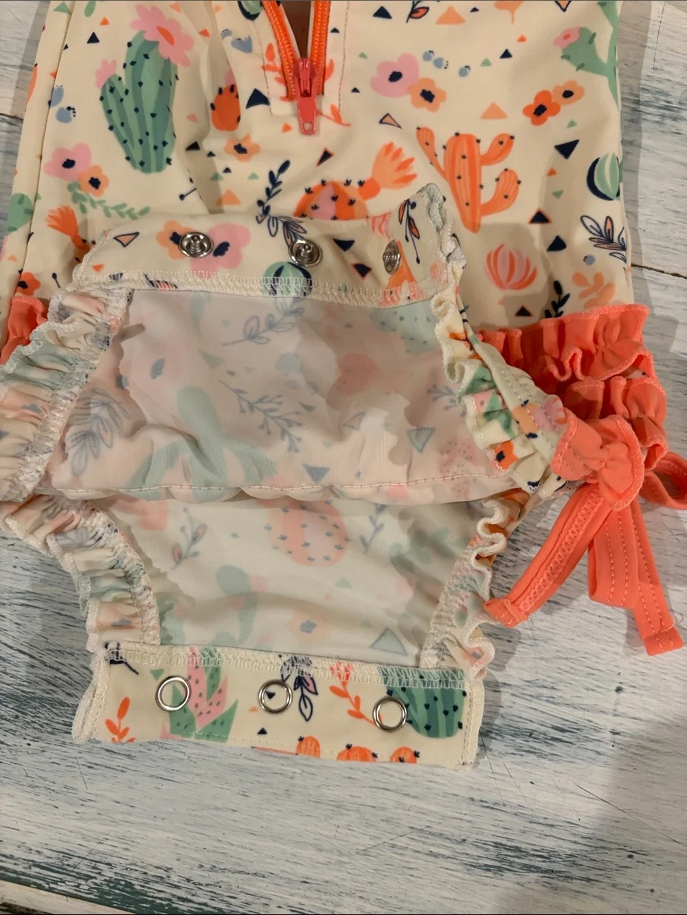 Ruffle Butts Cream Cactus-Print Long-Sleeve One-Piece with Coral Trim size 0-3mo